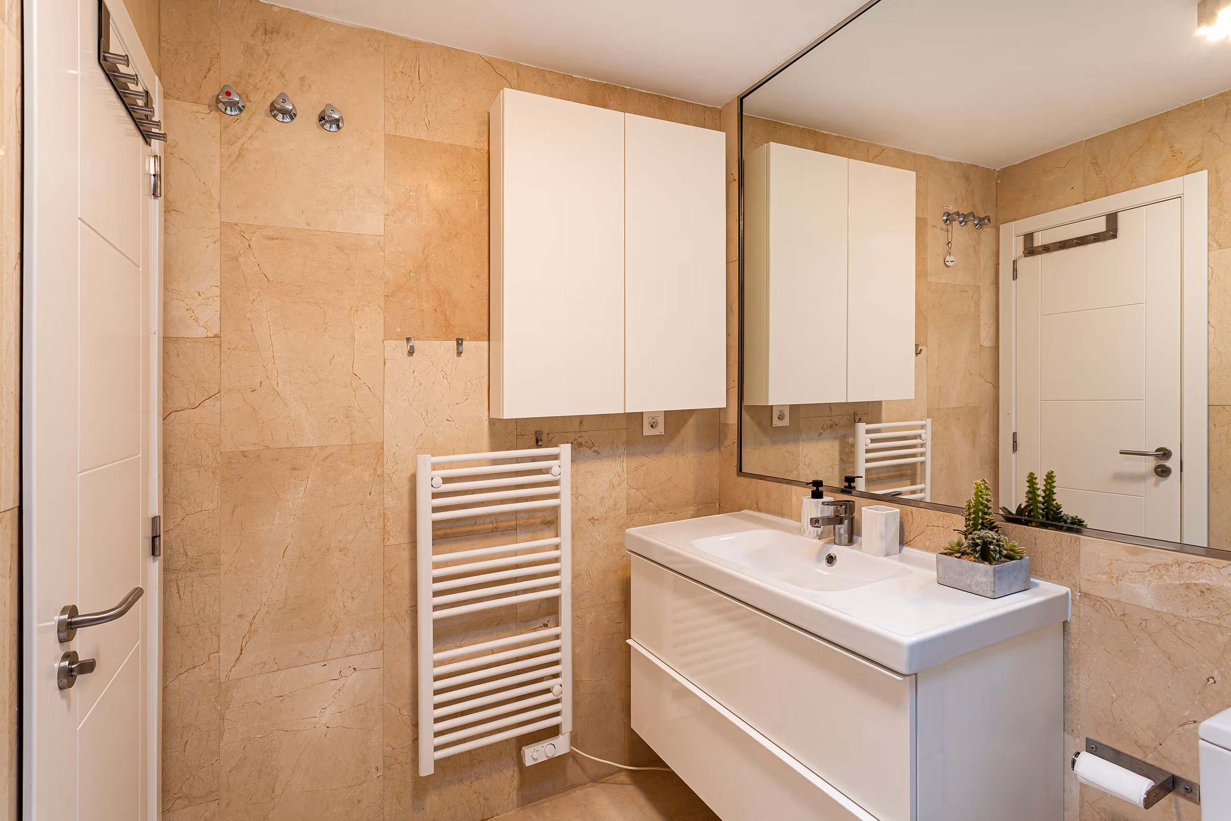 bathroom, sink and mirror playa del cura willa duplex